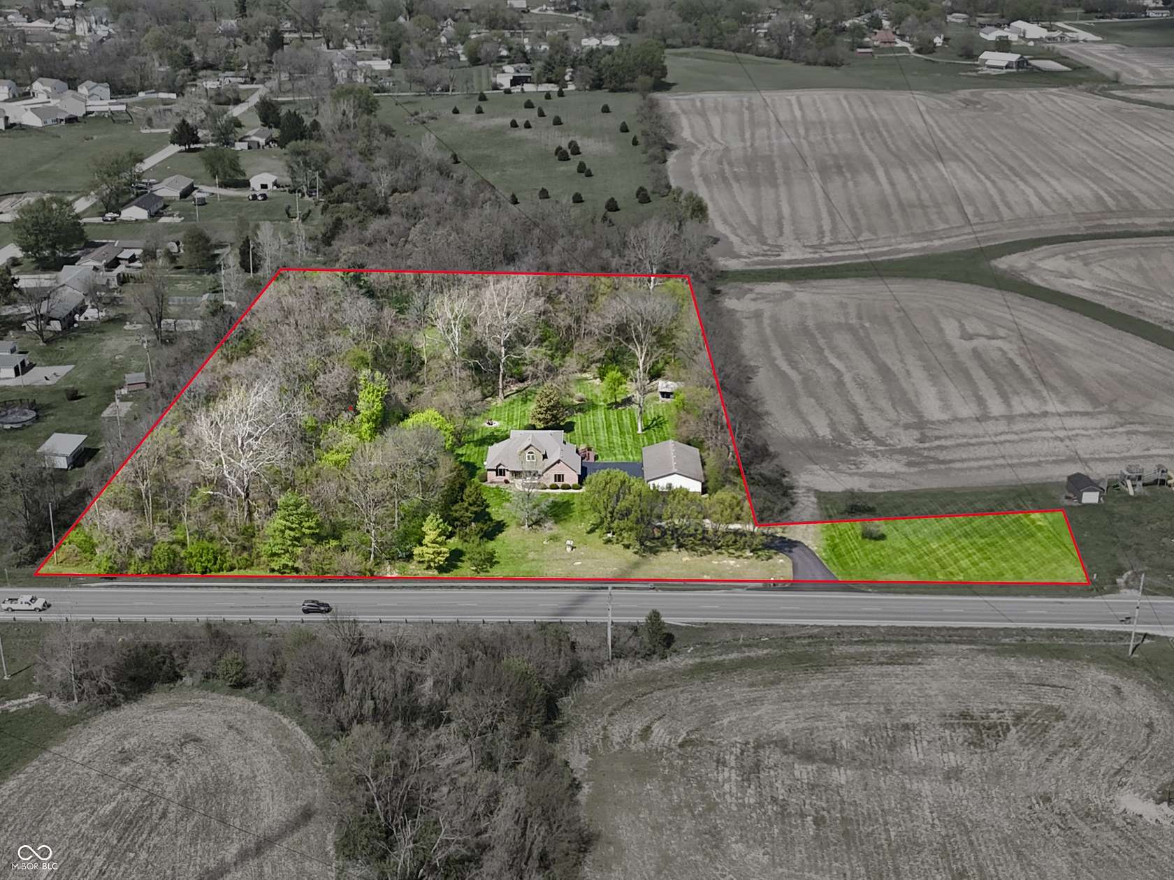 5.62 Acres of Land with Home for Sale in Trafalgar, Indiana