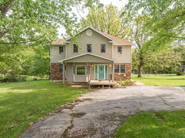 17.3 Acres of Land with Home for Sale in Fordland, Missouri