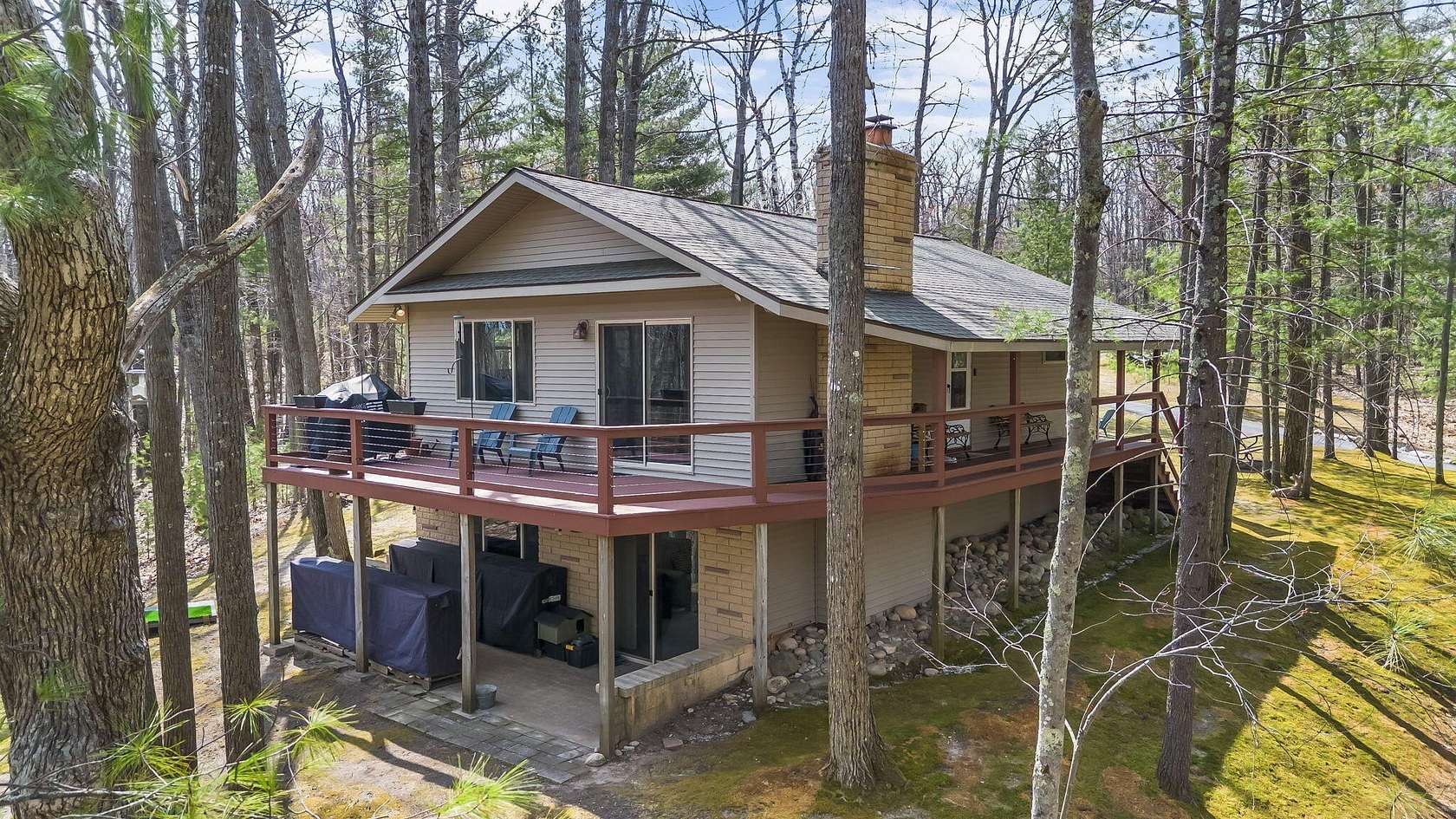 10 Acres of Recreational Land with Home for Sale in Indian River, Michigan
