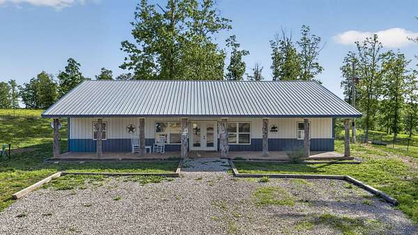 9.53 Acres of Land with Home for Sale in Mountain Grove, Missouri
