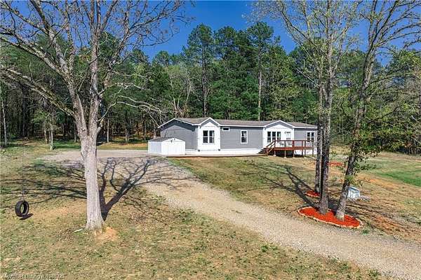 5.1 Acres of Land with Home for Sale in Mulberry, Arkansas