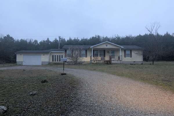 13.8 Acres of Recreational Land with Home for Sale in Cape Fair, Missouri