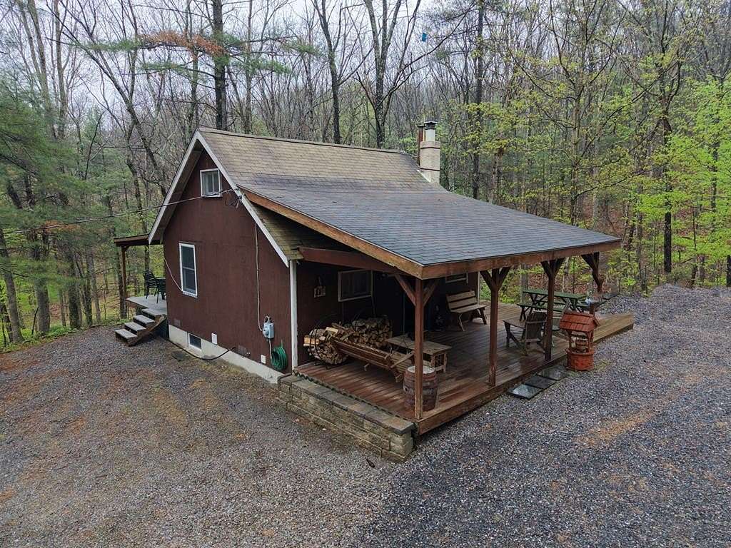 12.9 Acres of Recreational Land with Home for Sale in Three Springs, Pennsylvania