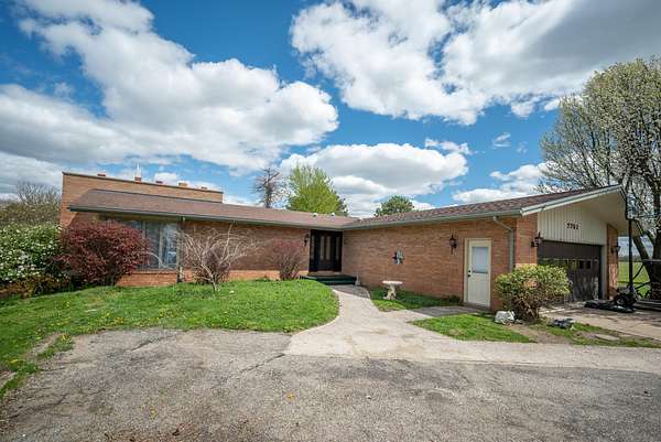 2.5 Acres of Land with Home for Sale in Sheridan, Michigan