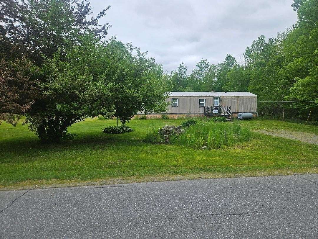 4 Acres of Land with Home for Sale in Pittsfield, Maine