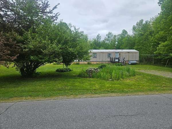4 Acres of Land with Home for Sale in Pittsfield, Maine