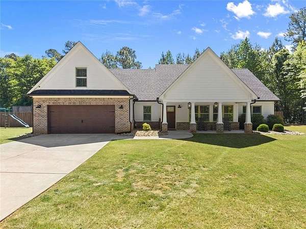 1.5 Acres of Land with Home for Sale in Commerce, Georgia