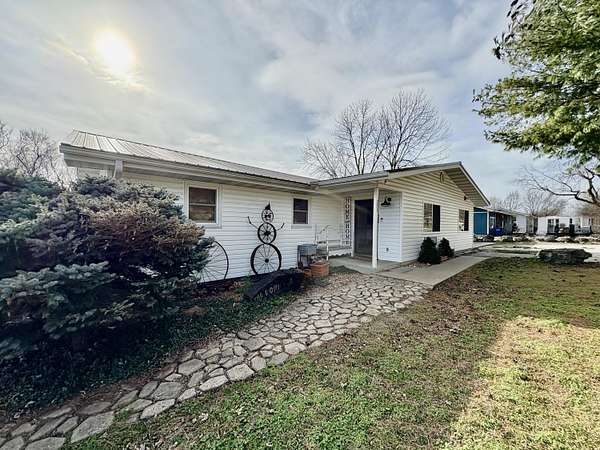 7 Acres of Land with Home for Sale in Greenfield, Missouri