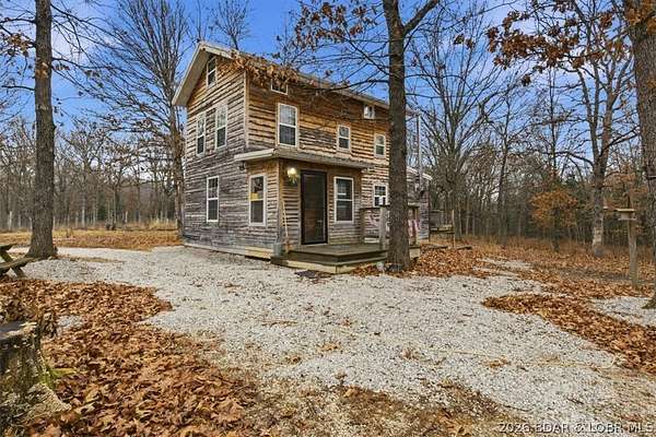 10 Acres of Land with Home for Sale in Cole Camp, Missouri