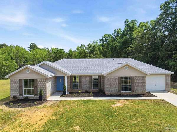 4.81 Acres of Land with Home for Sale in Molino, Florida
