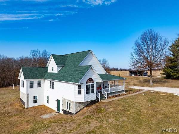 8.7 Acres of Land with Home for Sale in Bowling Green, Missouri