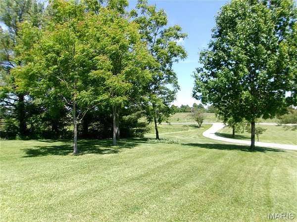 8.7 Acres of Land with Home for Sale in Bowling Green, Missouri