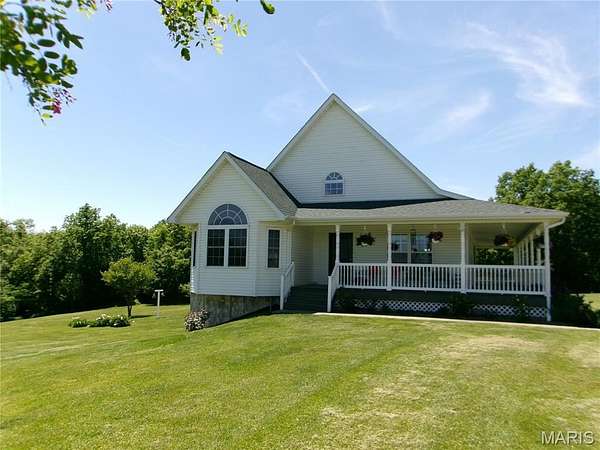 8.7 Acres of Land with Home for Sale in Bowling Green, Missouri