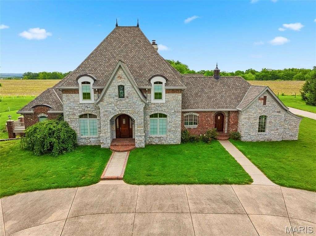 187 Acres of Agricultural Land with Home for Sale in Elsberry, Missouri