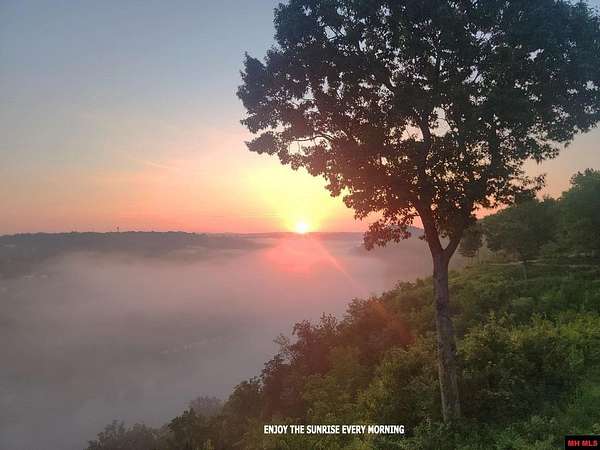 2 Acres of Land with Home for Sale in Flippin, Arkansas