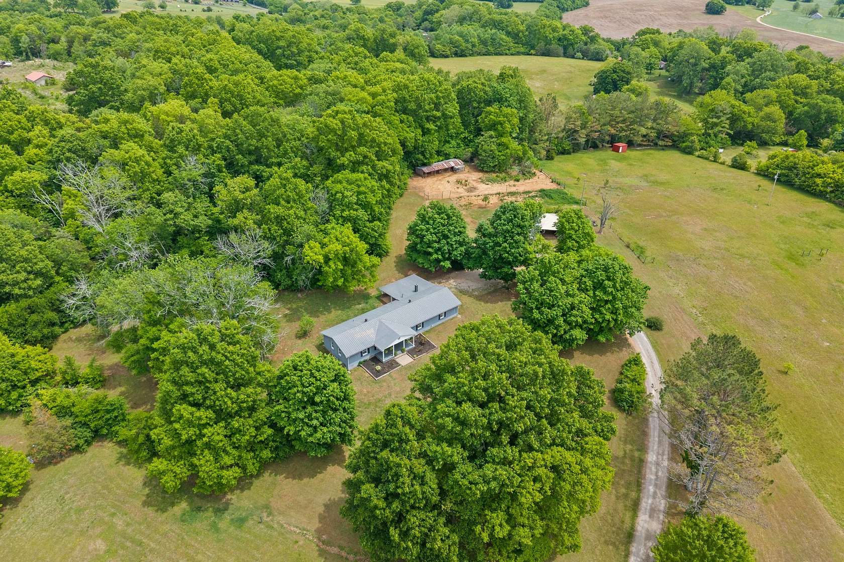6.3 Acres of Land with Home for Sale in Santa Fe, Tennessee