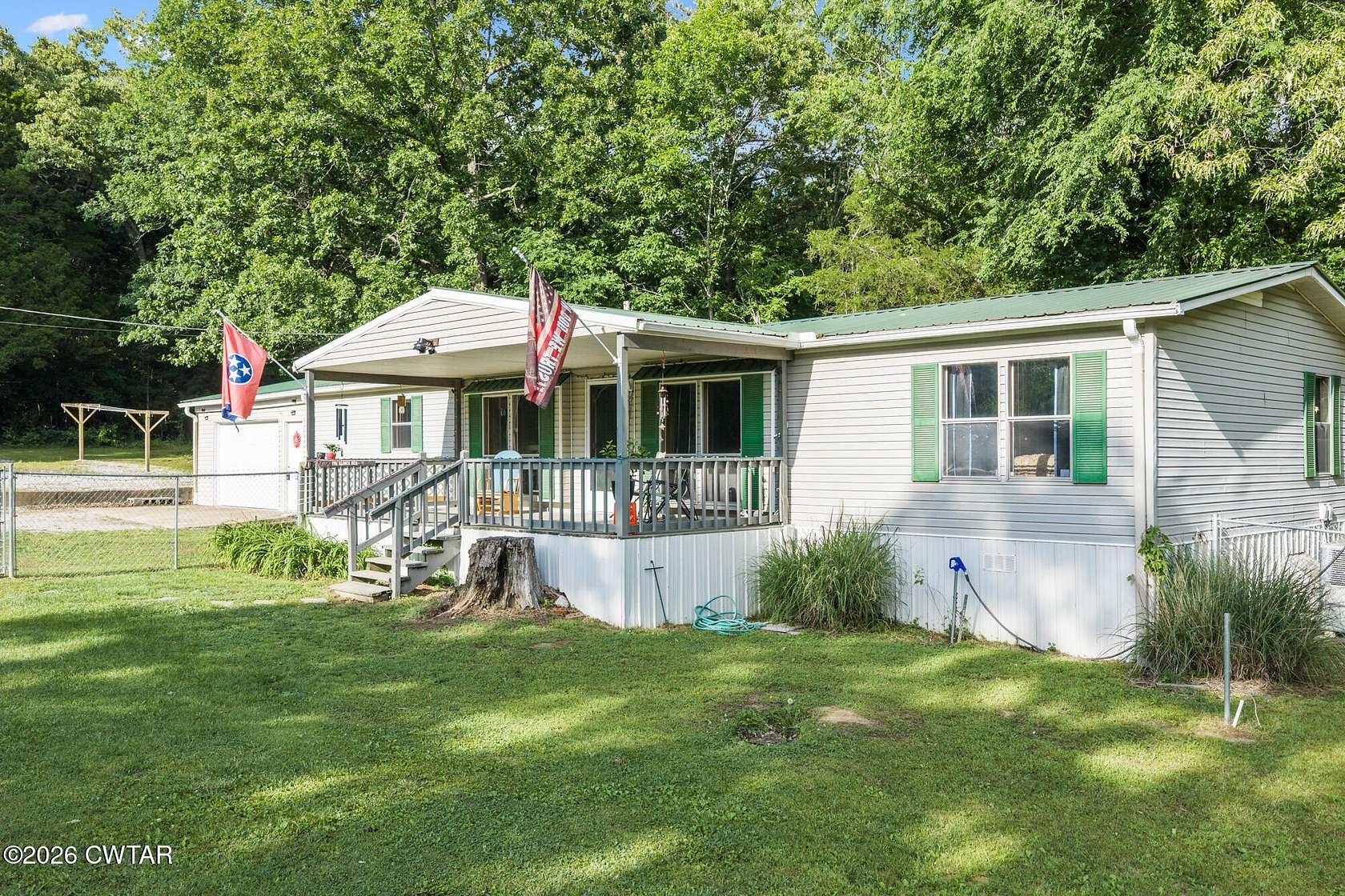 8 Acres of Land with Home for Sale in Scotts Hill, Tennessee