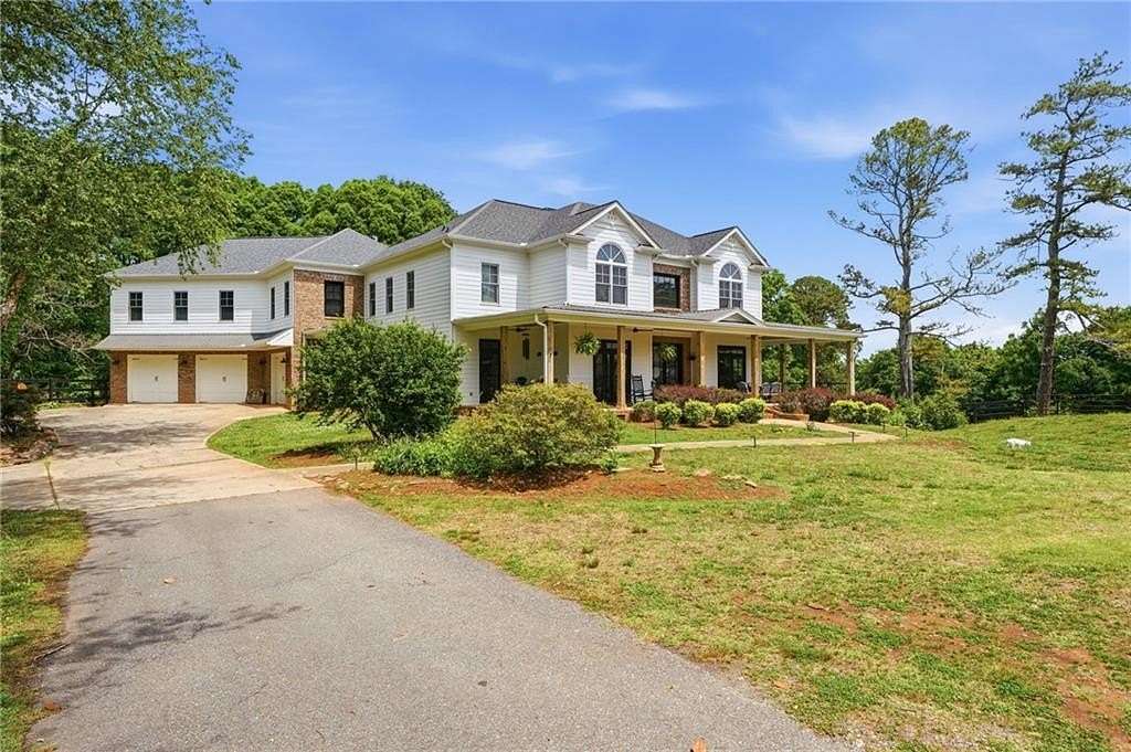 12.4 Acres of Land with Home for Sale in Cumming, Georgia