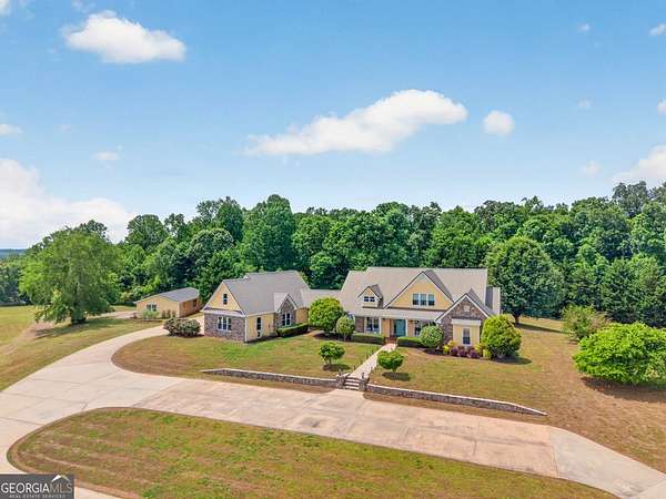 9.53 Acres of Land with Home for Sale in Homer, Georgia