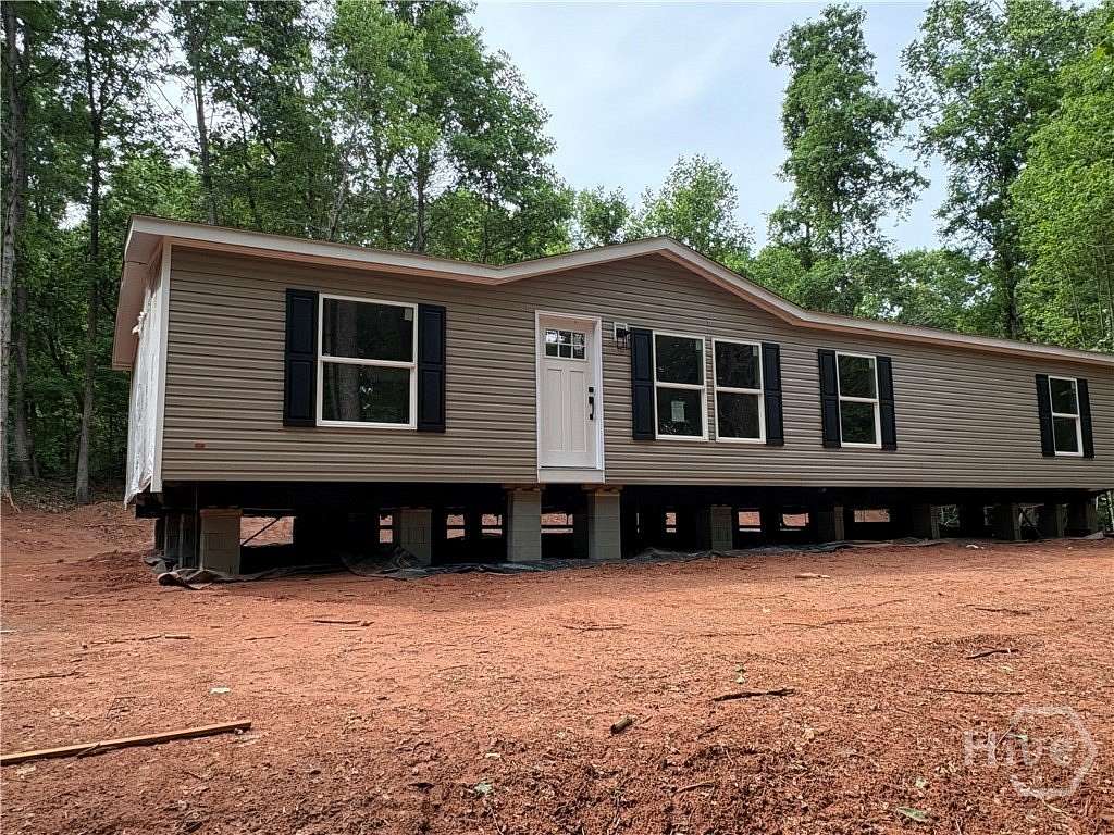 6.52 Acres of Land with Home for Sale in Commerce, Georgia
