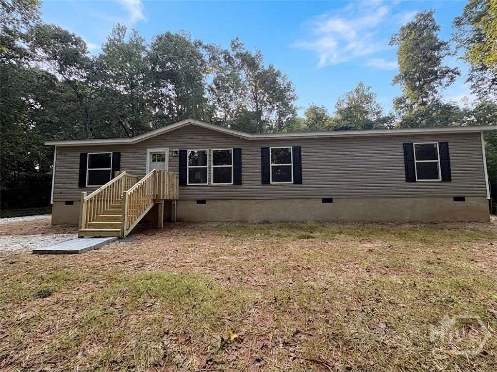 6.52 Acres of Land with Home for Sale in Commerce, Georgia