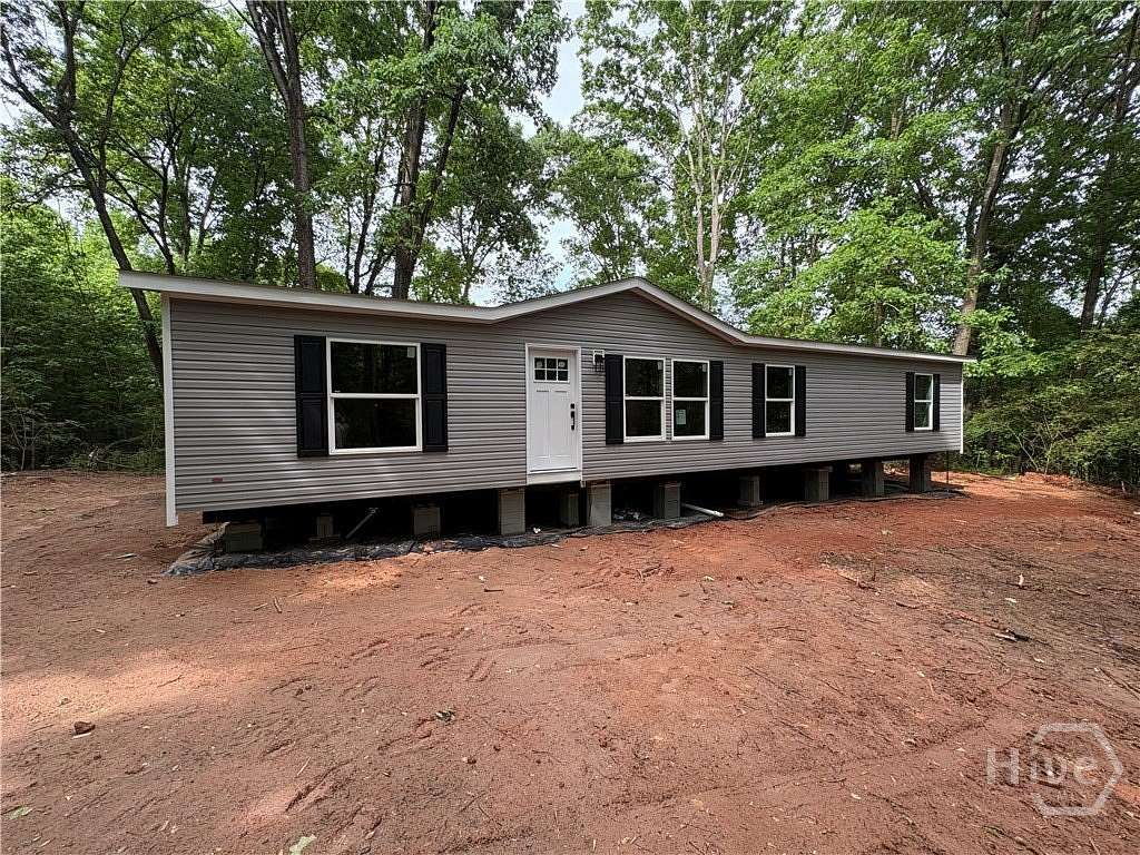 7 Acres of Land with Home for Sale in Commerce, Georgia