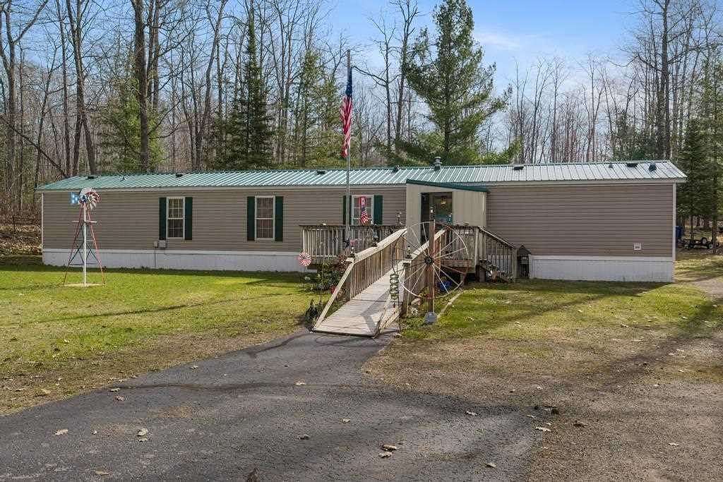 5.87 Acres of Land with Home for Sale in Indian River, Michigan