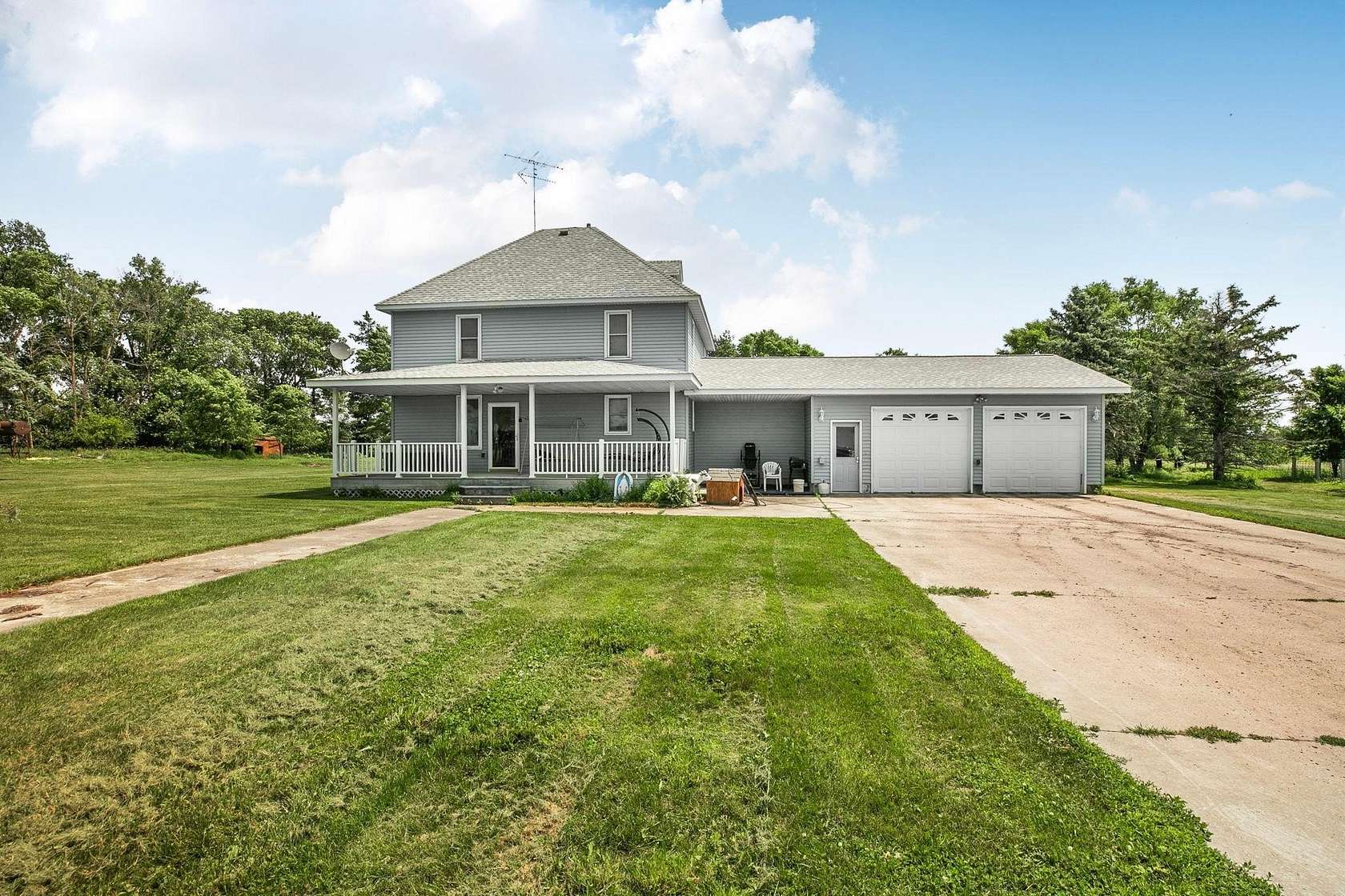 212 Acres of Agricultural Land with Home for Sale in Paynesville, Minnesota