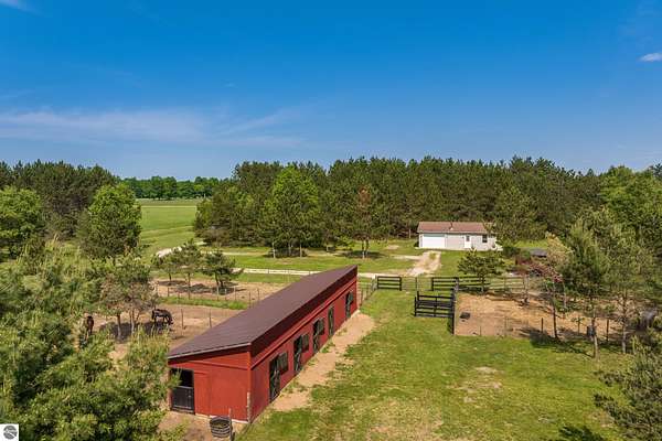30 Acres of Agricultural Land with Home for Sale in Kalkaska, Michigan