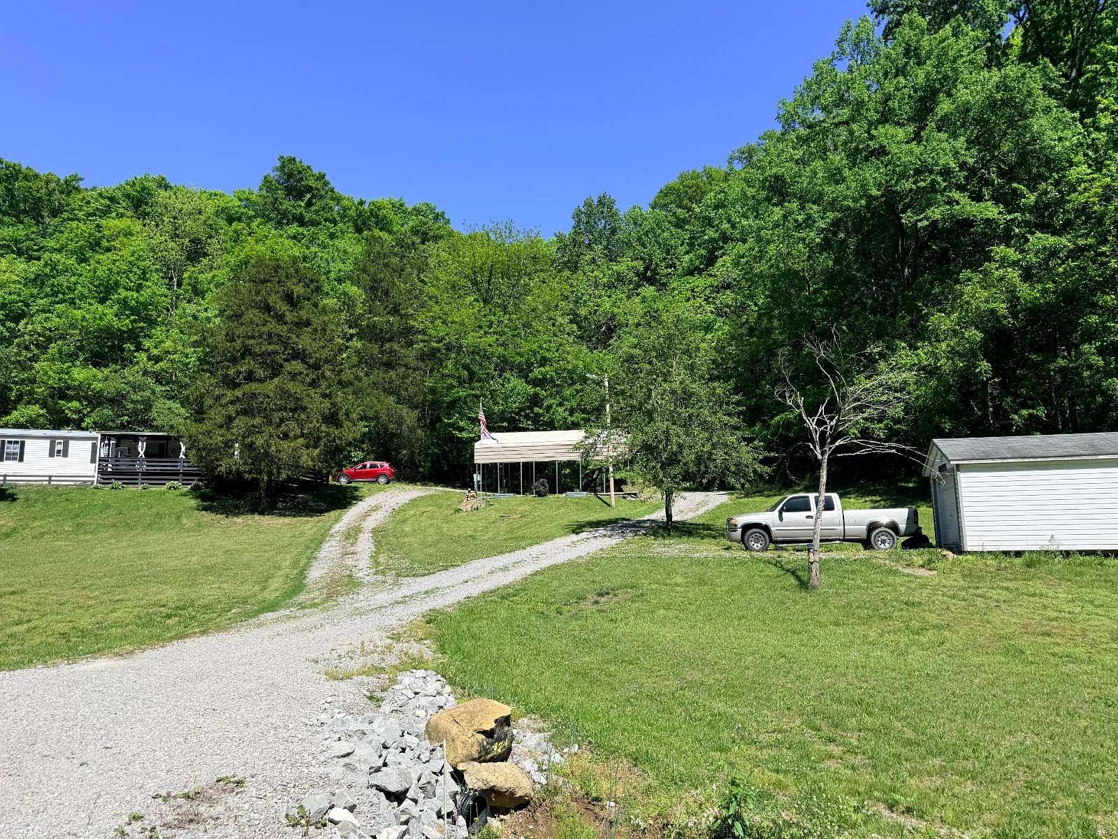 13.1 Acres of Land with Home for Sale in Burkesville, Kentucky