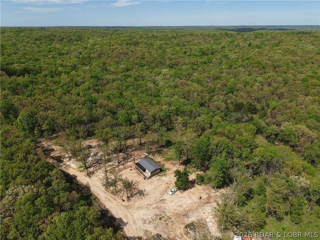 21.8 Acres of Recreational Land with Home for Sale in Stover, Missouri