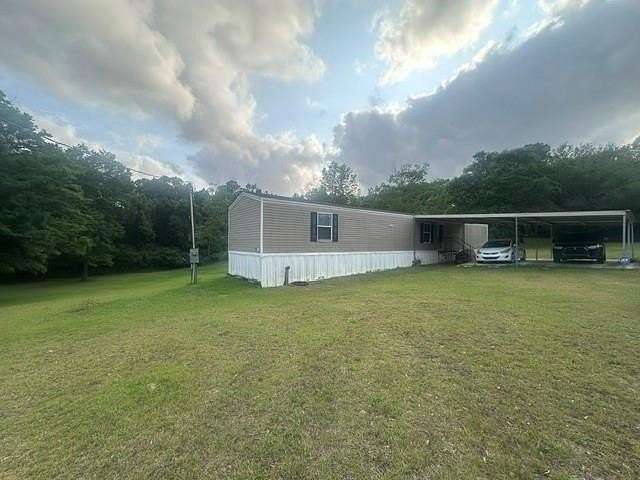 2.48 Acres of Land with Home for Sale in Eight Mile, Alabama