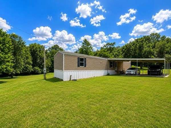 2.48 Acres of Land with Home for Sale in Eight Mile, Alabama