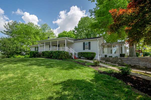 13.7 Acres of Land with Home for Sale in Winchester, Kentucky