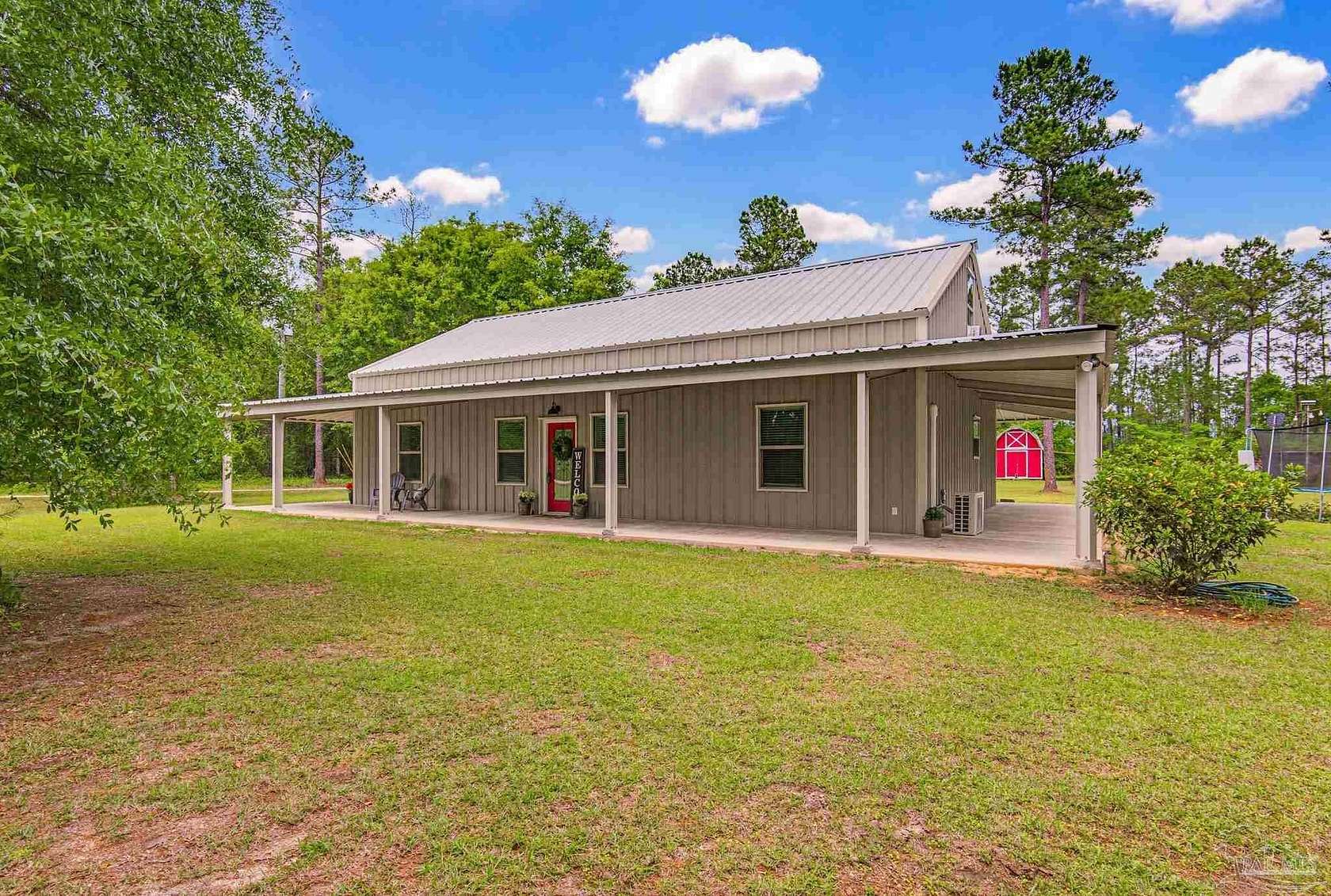 10 Acres of Land with Home for Sale in Jay, Florida