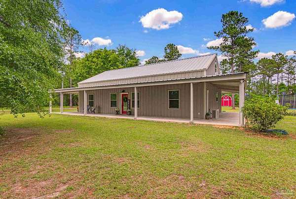 10 Acres of Land with Home for Sale in Jay, Florida