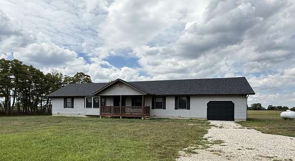 10 Acres of Land with Home for Sale in Rogersville, Missouri