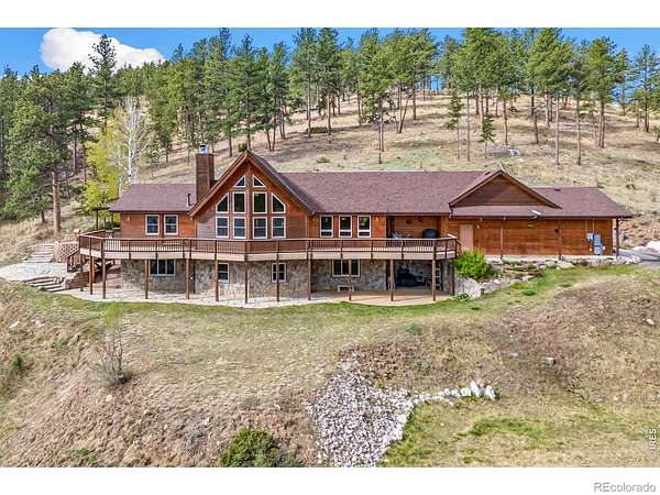 9.8 Acres of Land with Home for Sale in Loveland, Colorado