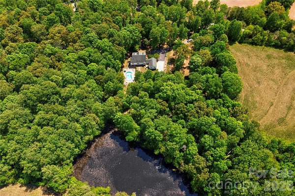 7.52 Acres of Land with Home for Sale in Lawndale, North Carolina