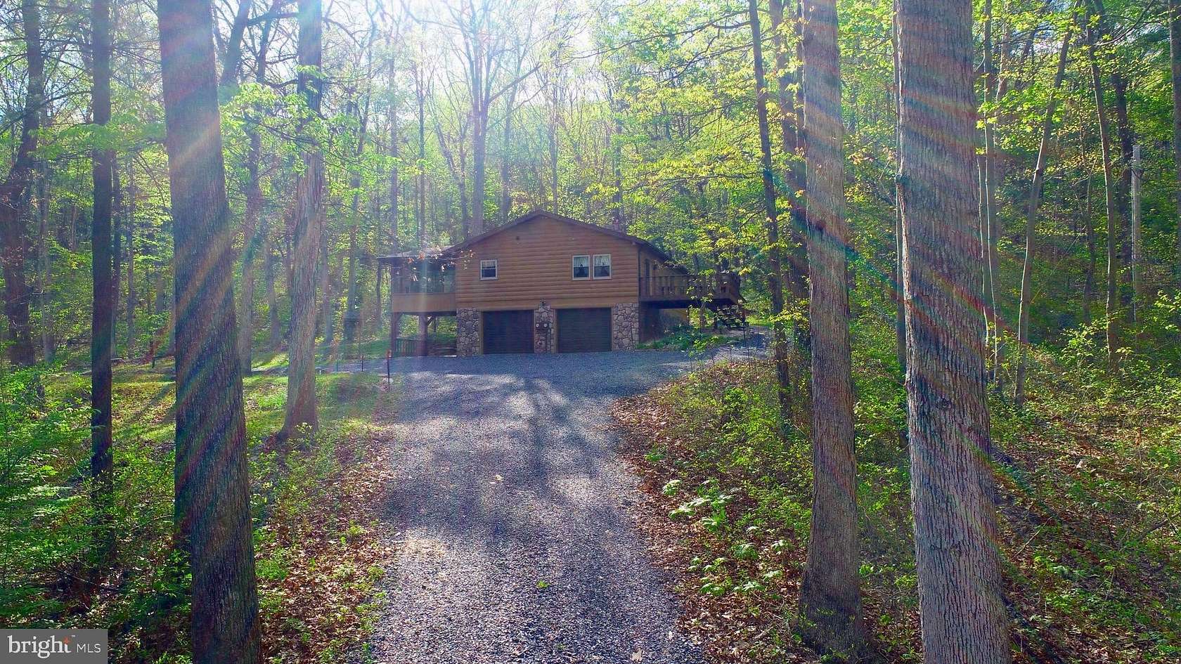 6.4 Acres of Land with Home for Sale in James Creek, Pennsylvania