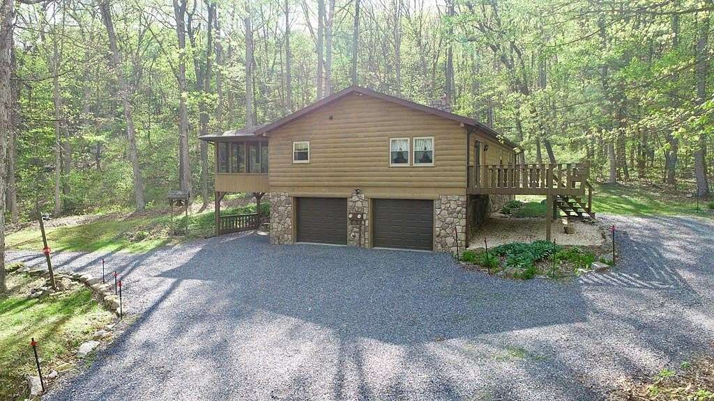 6.4 Acres of Land with Home for Sale in James Creek, Pennsylvania