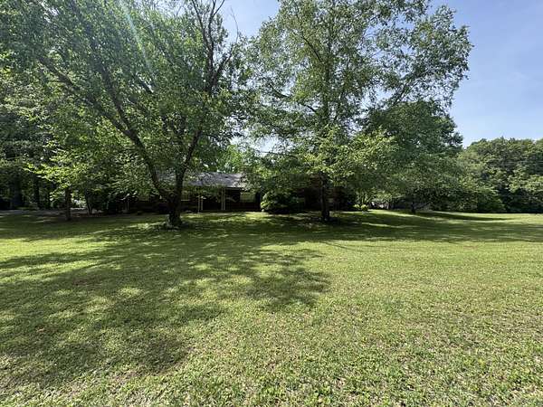 61 Acres of Land with Home for Sale in Fulton, Mississippi