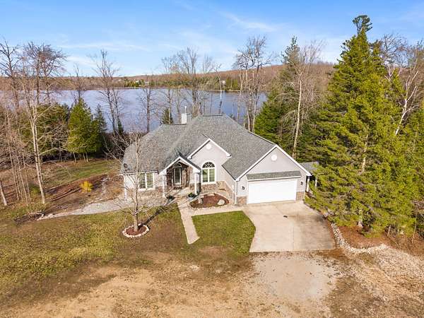 4.44 Acres of Land with Home for Sale in Levering, Michigan