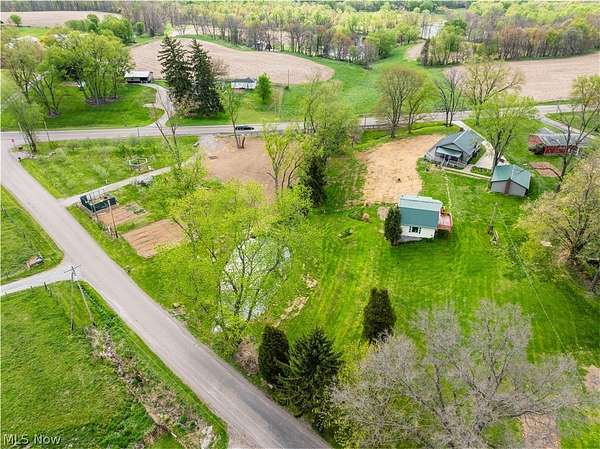 3.3 Acres of Land with Home for Auction in Dundee, Ohio