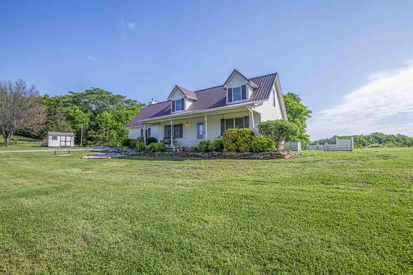 5.5 Acres of Land with Home for Sale in Friendsville, Tennessee