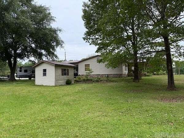 9.6 Acres of Land with Home for Sale in Sheridan, Arkansas