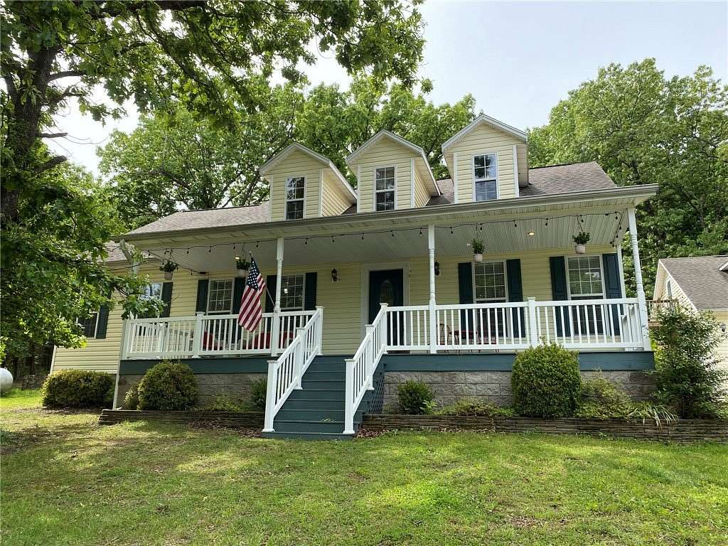 13.1 Acres of Land with Home for Sale in Berryville, Arkansas