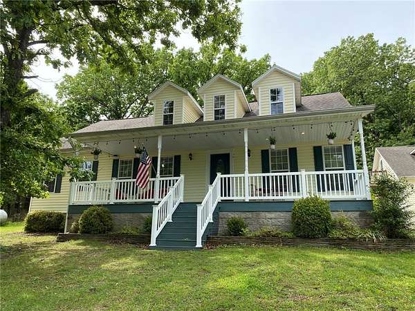 13.1 Acres of Land with Home for Sale in Berryville, Arkansas