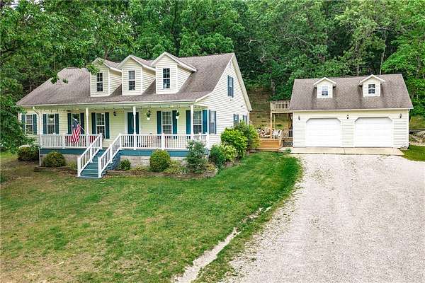 13.1 Acres of Land with Home for Sale in Berryville, Arkansas