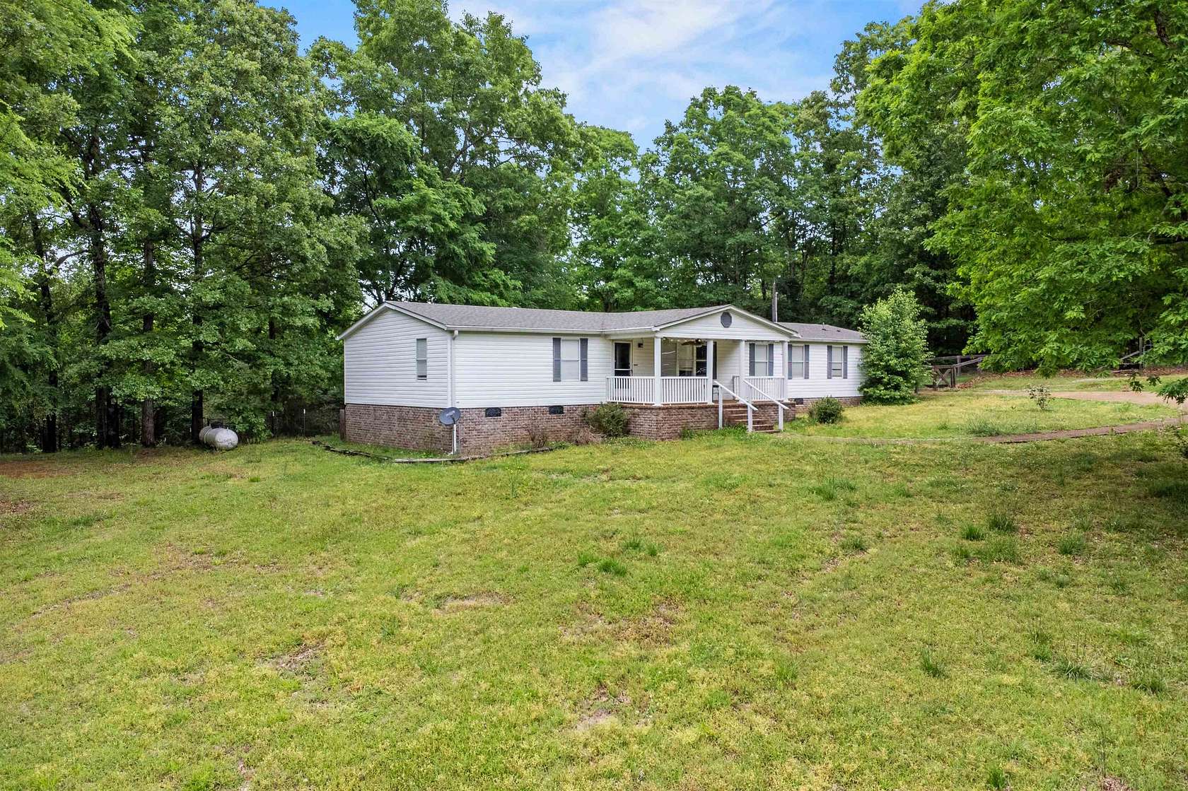 9.46 Acres of Land with Home for Sale in Somerville, Tennessee